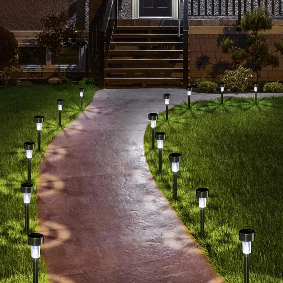 a front path in the evening illuminated by solar path lights